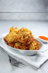 Uyen or talas goreng or fried taro is a popular fried snack from Medan, Indonesia, made from taro and shrimp