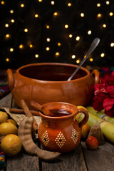 Christmas fruit punch on a wooden background