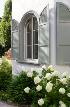 Pastel green mansion window