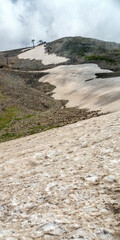 Snow in the summer on a mountain top. Close up.