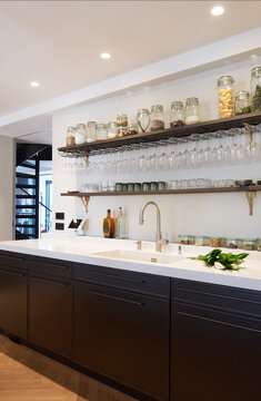 Industrial kitchen with glasses and jars