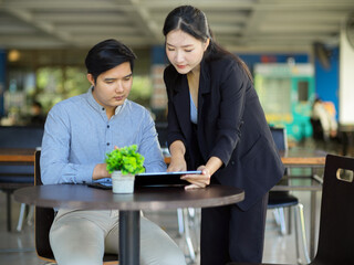 Executive female manager training her new staff