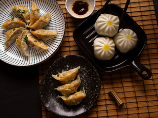 Original japanese gyoza dumplings and yummy pork buns.