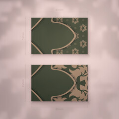 Business card in green color with Indian brown ornament for your contacts.