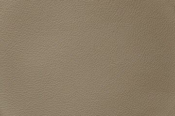 light beige background from genuine leather, solid beige background close up
