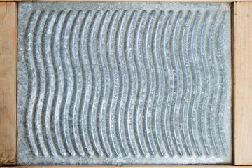 Abstract background embossed surface washboard.