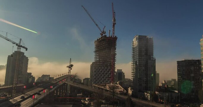 Timelapse video of a cloudy cityscape during sunset in Canada