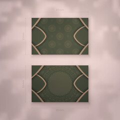 Business card in green with indian brown pattern for your personality.