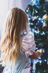 Little girl singing Christmas carols

