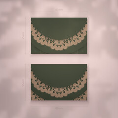 Business card in green with vintage brown pattern for your brand.