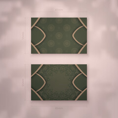 Business card in green with vintage brown pattern for your personality.