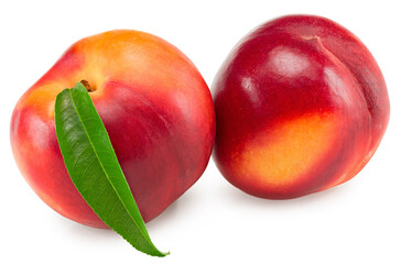 Nectarine with green leaf isolated on white background. clipping path