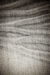 Texture of Vintage blue jeans close up.