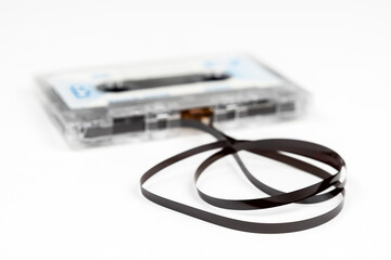 Old audio cassette with loose tape