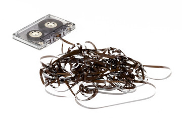 Old audio cassette with loose tape