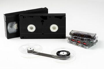 Audio and video cassette tape on white background