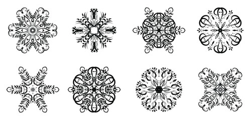 Set of circular decorative ornaments isolated on a white background. Graphic design elements. Vector illustration.