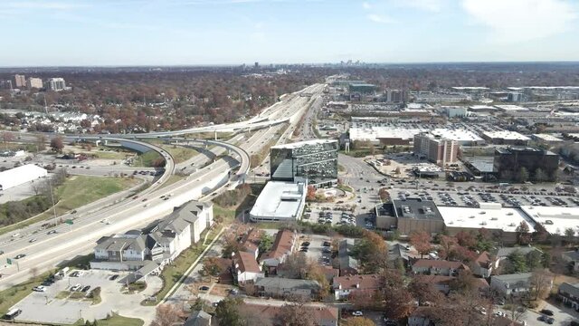 Drone shot moving forward Brentwood at the crossroad intersection between I-64 and I-170 in St. Louis, MO
