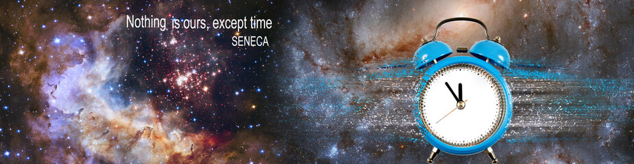 An image of a clock from which particles are separated against the space background.