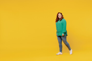 Full size body length side view profile fun happy vivid fancy young ginger chubby overweight woman...