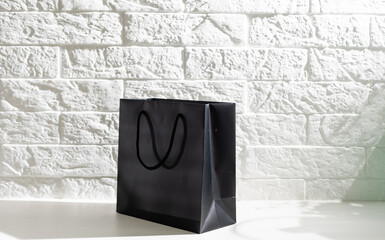 Black shopping bag on white.