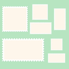 Blank postage stamps isolated on a blue background
