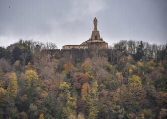 San Sebastian, Spain - 28 Nov, 2021: Autumn colours over La Concha Bay and Mount Urgull on the...