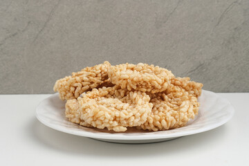 Rengginang or traditional rice cracker, Indonesian traditional snacks made from glutinous rice, savory and crunchy.
