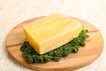 Parmesan cheese piece over board