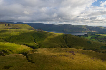 Fototapeta premium Aerial summer view in cloudy Lake District, United Kingdom
