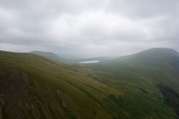 Aerial summer view in cloudy Scafell Pike, Lake District, United Kingdom