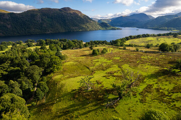 Aerial summer view of sunny surroundings of Ullswater lake, Lake District, United Kingdom