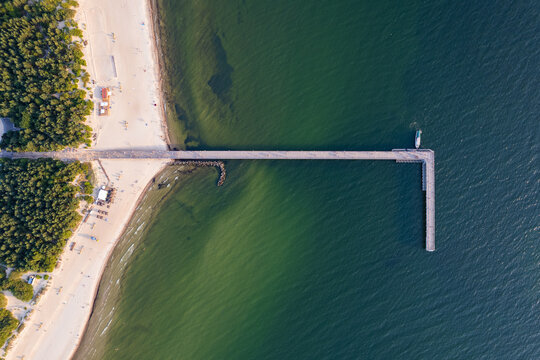 Aerial summer sunset view of sunny resort Palanga, Lithuania. Baltic sea, Palanga Bridge - Pier