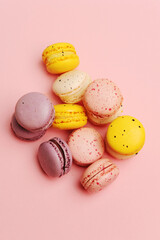 French dessert colorful macarons on pink background