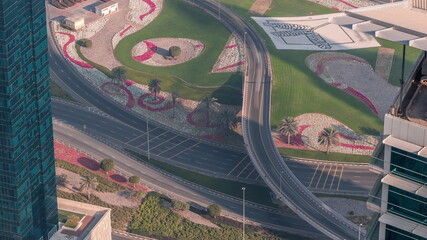 Big crossroad junction between JLT district and Dubai Marina intersected by Sheikh Zayed Road aerial timelapse.