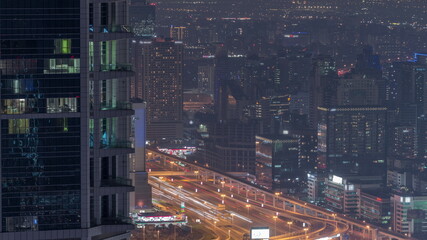 Dubai Aerial view showing al barsha heights district area night timelapse