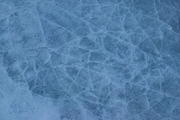 Obraz na płótnie Canvas Texture of the cracked ice. Winter background