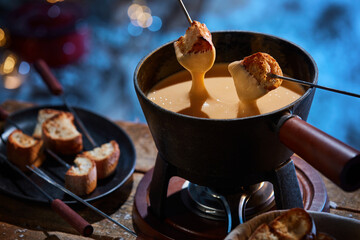 Tasty croutons in cheese fondue - obrazy, fototapety, plakaty