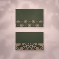 Green business card with brown mandala ornament for your personality.