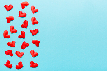 Valentine day background with red hearts, top view with copy space