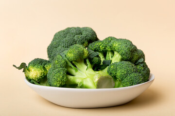 broccoli of fresh green broccoli in bowl over coloredbackground. , close up. Fresh vegetable