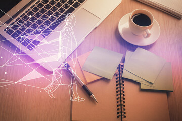 Start up theme drawing over computer on the desktop background. Top view. Double exposure....