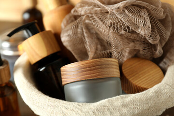 Concept of gift with basket of cosmetics, close up