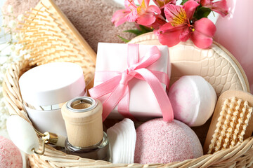Concept of gift with basket of cosmetics, close up