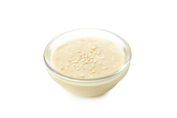 Tahini sauce in bowl isolated on white background