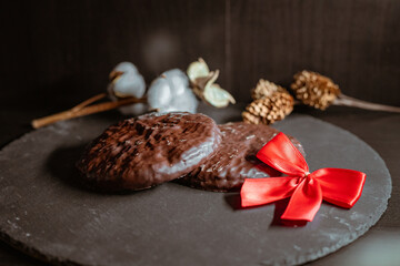 Harmonious Christmas photo with chocolate gingerbread