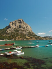 AT THE JUNCTION OF THE MOUNTAINS AND THE SEA