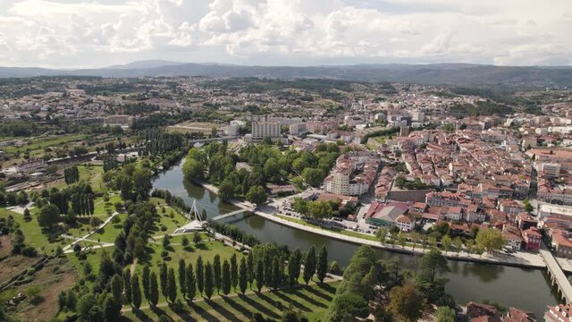 Aerial forward view of Chaves in vast cityscape. Portugal. Daytime. Real time.