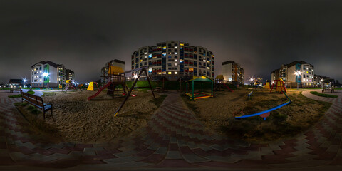 night 360 hdri panorama near playground in middle of modern multi-storey multi-apartment...