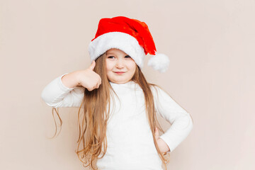 girl, child, christmas, santa hat, santa claus, holiday, tradition, funny, cap, childhood, beautiful, beauty, caucasian, celebration, banner, background, cheerful, adorable, claus, cute, december, dec